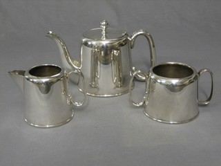 An Art Deco silver plated hotelware 3 piece tea service comprising teapot, twin handled sugar bowl and cream jug