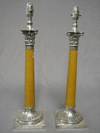 A pair of silver plated and marble finished table lamps with Corinthian capitals 17"