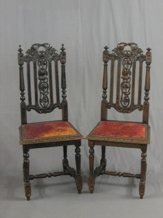 A pair of Victorian carved oak Carolean high back dining chairs by Hewitson Milner & Thexton of Tottenham Court Road
