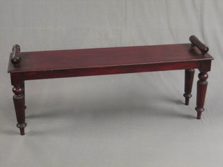 A 19th Century rectangular stained mahogany hall bench, raised on turned and reeded supports 48"