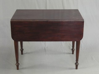 A 19th Century mahogany Pembroke table fitted a drawer and raised on turned supports 36"