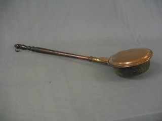 A 19th Century engraved copper warming pan with turned fruitwood handle marked EP