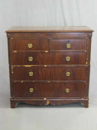 A Victorian Scots mahogany chest, with crossbanded top and secret drawer, the base fitted 2 short and 3 long drawers with column decoration to the side, raised on bracket feet 45"