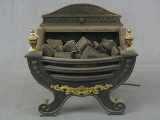 An iron gas fire grate with burning coal effect 17"