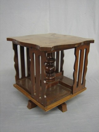 An Edwardian square mahogany revolving table top bookcase 14 1/2"