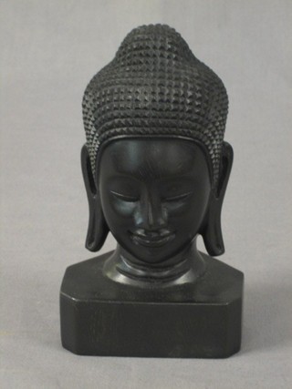 A 20th Century carved Eastern hardwood bust of Buddha 7"