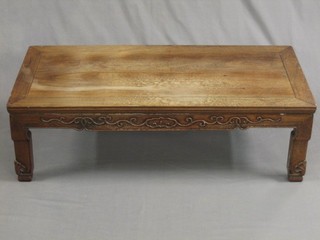 A 19th Century Padouk wood opium table with carved apron and raised on carved supports 39" (split to top)