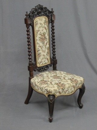 A Victorian Carolean style mahogany high back hall chair, with upholstered seat and back, raised on French cabriole supports
