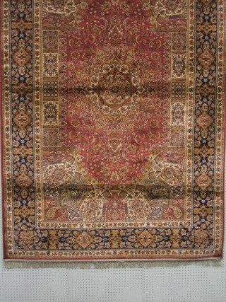 A rose coloured Persian design Belgian rug 90" x 59"