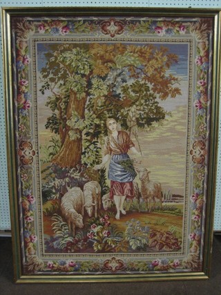 A Berlin wool work style tapestry "Shepherdess and Sheep" 54" x 39"