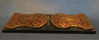 A pair of 19th Century red boulle expanding book ends (slight damage to base of slide)