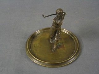 An Art Deco bronze golfing ashtray, the finial in the form of a standing golfer 4"