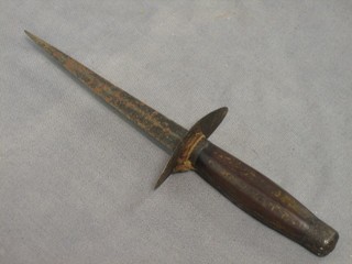 A 19th/20th Century double edge dagger with 5" blade and wooden handle