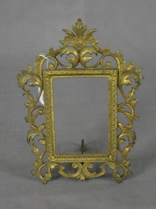 A pierced gilt metal easel photograph frame 12"