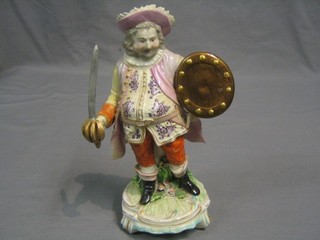 An 18th/19th Century porcelain figure of a standing John Falstaff with sword and shield (sword and shield f and r) 9"