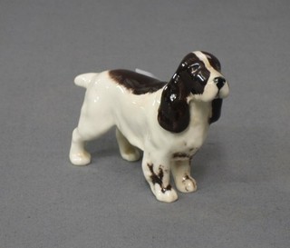 A Beswick figure of a standing Springer Spaniel, 3"
