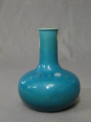 An Oriental turquoise glazed club shaped vase 7 1/2"