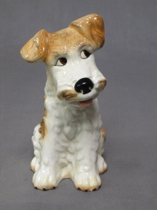 A Sylvac figure of a seated dog, the base marked 1379, 7"