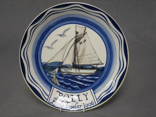 A circular Poole Pottery plate decorated the racing yacht Poly Poole Drawler 1906, 11"
