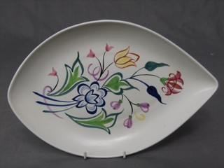 An oval Poole Pottery dish, the base with dolphin mark and BN, 12"