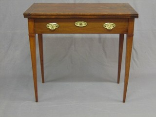 A 19th Century Country oak card table, raised on square tapering supports 30"