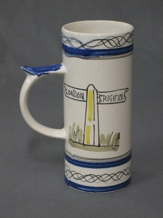 A Rye Pottery tankard with black and blue banding, and decorated finger sign post London to Brighton, base impressed Made in England (chip to base) 7"