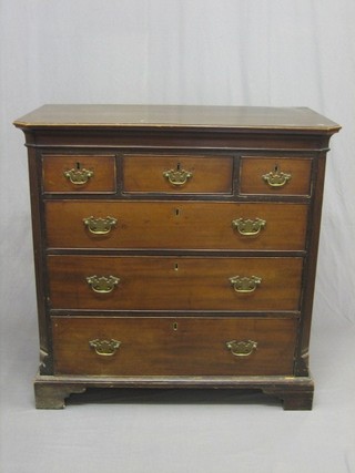A Georgian oak chest of 3 short and 3 long drawers, with fluted canted corners, raised on bracket feet 41" (formerly top of a chest on chest)