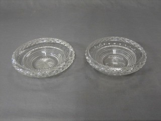 A pair of circular cut glass bowls 8"