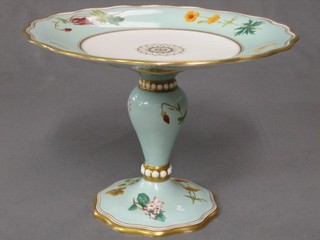 A Victorian turquoise floral patterned and gilt banded comport, 9"