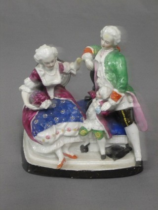 A 19th Century biscuit porcelain figure group of a seated family 6" (f)