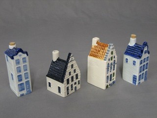 17 various blue Delft gin bottles in the form of house, made for KLM first class passengers