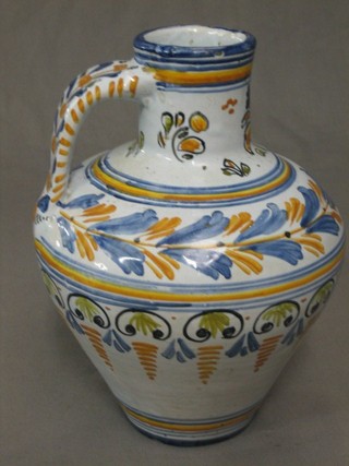 A faience jug with stylised floral decoration, base indistinctly signed, (chips to rim) 10"