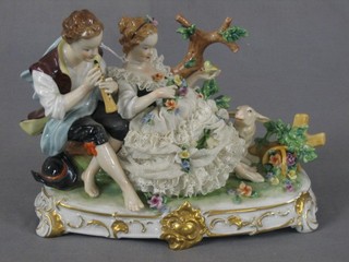 A  20th Century Continental porcelain figure group Shepherd and Shepherdess 9"