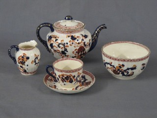 A 22 piece Derby style tea service with teapot, slop bowl, sugar bowl cracked, 6 tea plates 6 1/2" (4 cracked), cream jug, 6 cups and 6 saucers (all cracked)