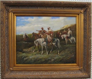 A 20th Century oil painting on board "Arab Horsemen" 15" x 19"