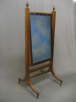 A handsome Georgian rectangular adjustable cheval mirror contained in a mahogany swing frame (silver damaged to centre of plate)
