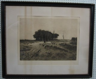 A monochrome print "Figure Driving Sheep" 15" x 16" contained in a Hogarth frame