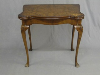 A 1930's Queen Anne style figured walnut card table 29"