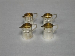 8 Art Deco Continental silver waisted miniature cream jugs, 4 ozs