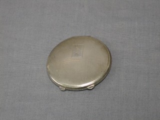 An Art Deco silver compact with engine turned decoration, Birmingham 1949, with hinged lid engraved JEN