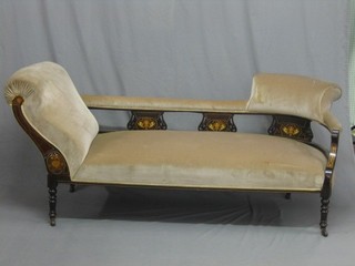 An  Edwardian inlaid rosewood show frame sofa, raised on turned supports 70"