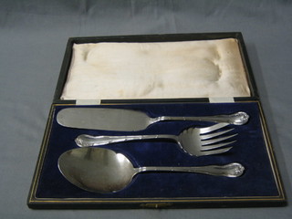 A silver plated 3 piece serving set with fork, spoon and flan lifter, cased