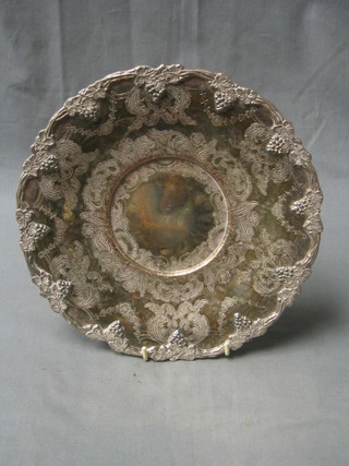 A circular engraved silver plated salver with vinery decoration 10"