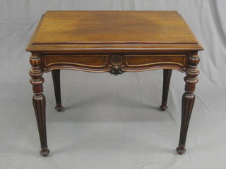 A 19th Century Continental walnut side table fitted a frieze drawer, raised on turned and fluted supports 32" (reduced in height)
