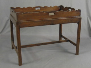 A mahogany Butler's tray and stand 28"