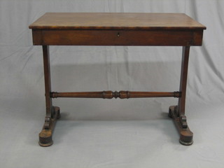 A William IV mahogany stretcher table fitted a drawer raised on standard end supports united by an H framed stretcher 36"