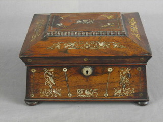 A Victorian inlaid rosewood work box of sarcophagus form inlaid mother of pearl, the interior fitted 6 Victorian carved mother of pearl cotton reels,  raised on bun feet 12",