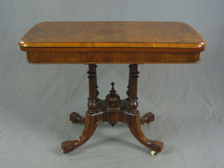 A Victorian figured walnut card table, raised on 4 turned columns with tripod base, 39"