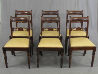A set of 6 Georgian bar back dining chairs with pierced mid-rails and upholstered drop in seats, raised on turned supports