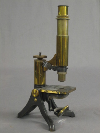 A Henry Crough brass single pillar student's microscope, the base marked Lond 54 44